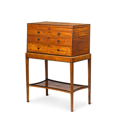 View full screen - View 1 of Lot 142. A satinwood and ebony strung collector's cabinet-on-stand, probably Anglo-Ceylonese, first quarter 19th century.