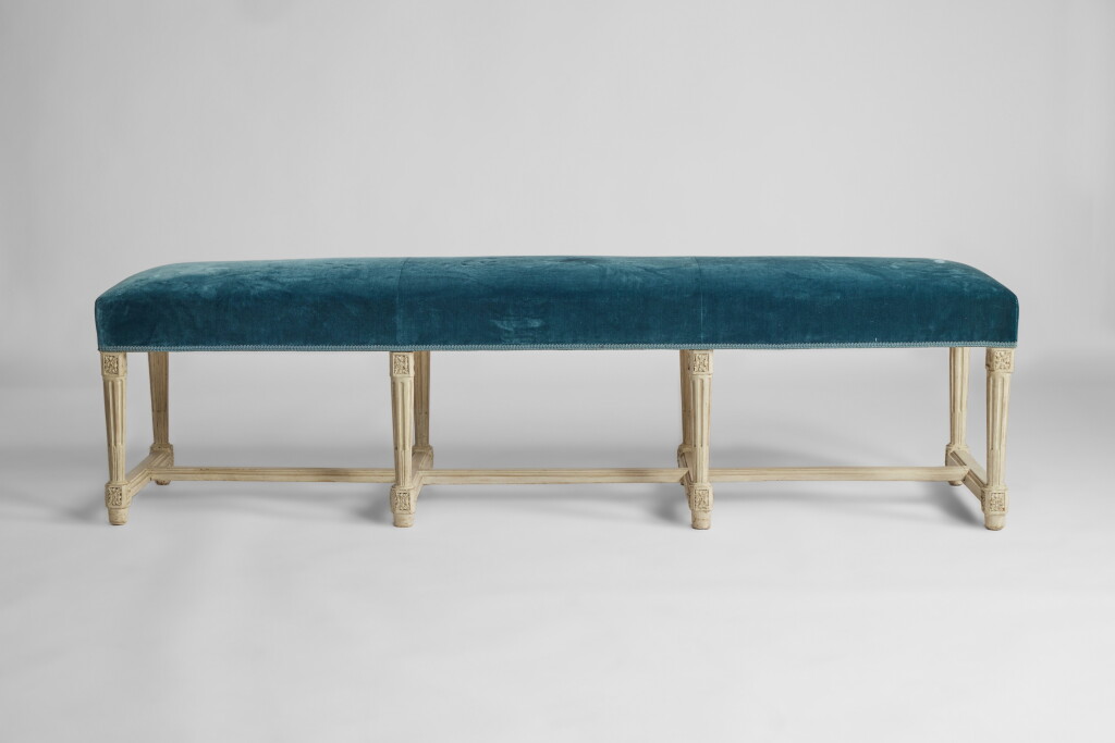 View full screen - View 1 of Lot 375. A Royal Louis XVI Grey-Painted Beechwood Banquette, Attributed to Nicolas-Quinibert Foliot, Circa 1785.