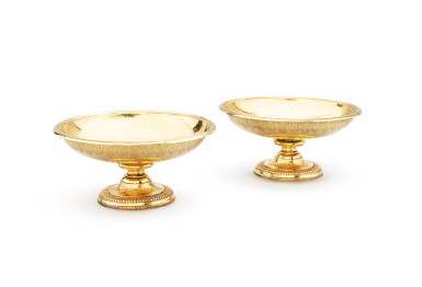 View full screen - View 1 of Lot 381. A pair of silver-gilt stands in the Regence style, Puiforcat, Paris, circa 1900 | Paire de présentoirs de style Régence en vermeil par Puiforcat, Paris, vers 1900.