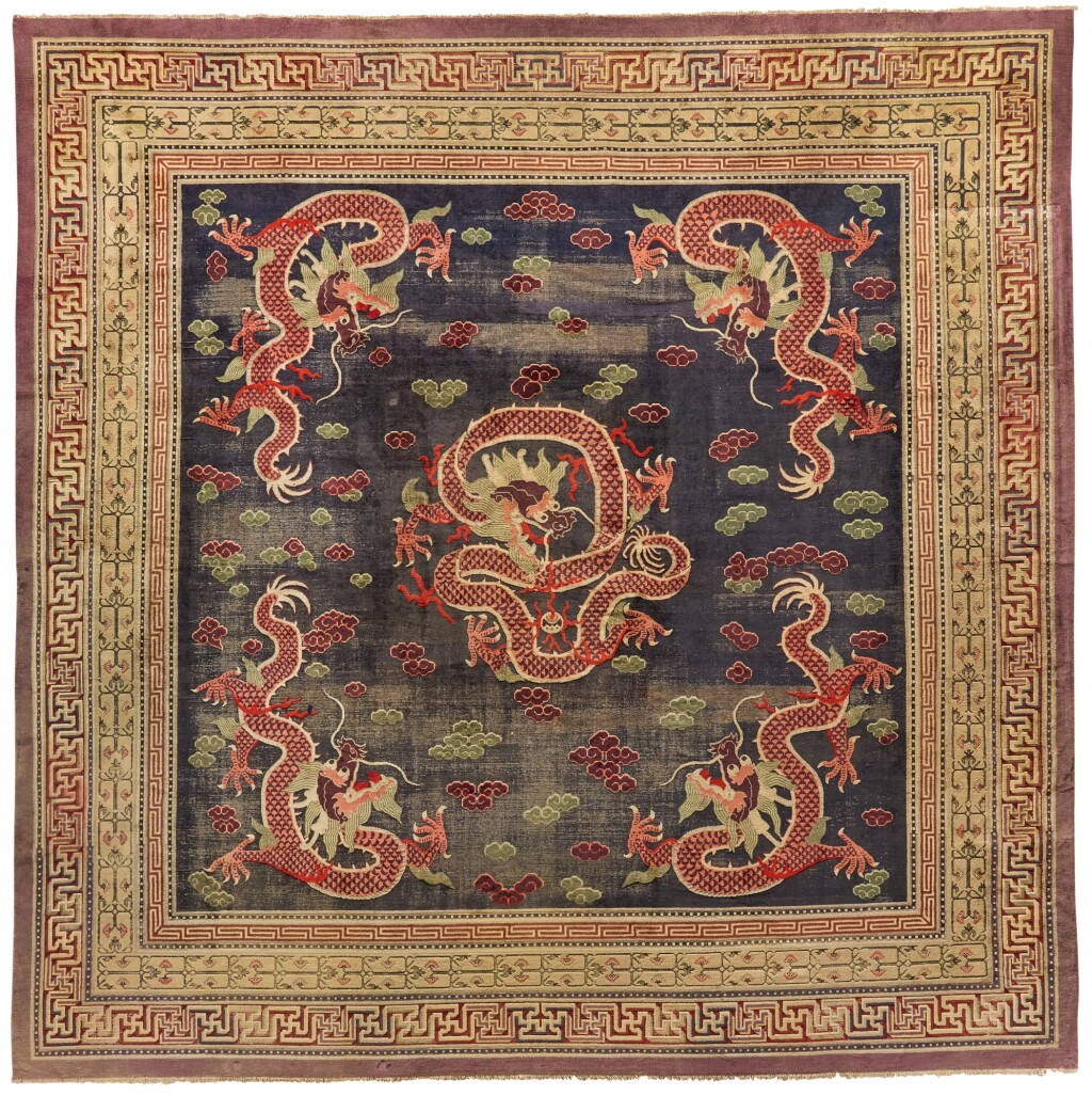 View full screen - View 1 of Lot 98. A large blue-ground ‘red dragons’ hall carpet, China - Tibet, 19th - early 20th century | 中國或西藏 十九至二十世紀初 藍地紅龍紋地毯.