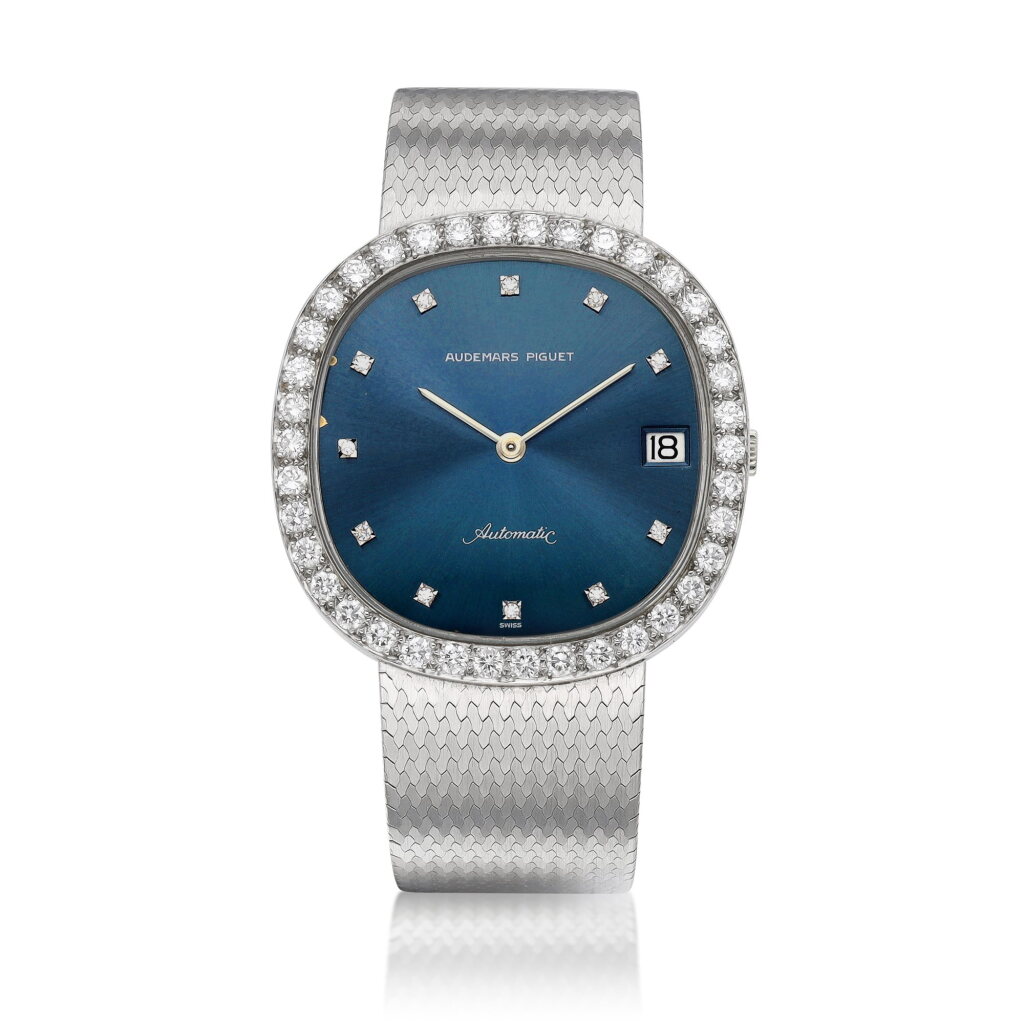 View full screen - View 1 of Lot 8074. A white gold and diamond-set bracelet watch with date, Circa 1970 | 愛彼 | 白金鑲鑽石鏈帶腕錶,備日期顯示,約1970年製.