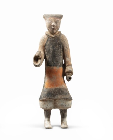 View full screen - View 1 of Lot 2180. A figure of a standing attendant, China, probably Han dynasty Personnage en terre cuite polychrome, Chine, probablement dynastie Han.