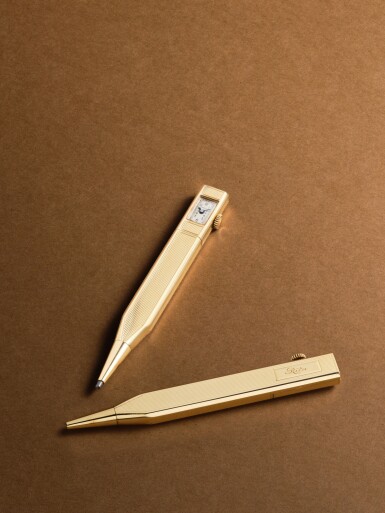 View full screen - View 1 of Lot 2153. A yellow gold propelling pencil with integrated watch, Circa 1945 .