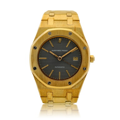 View full screen - View 1 of Lot 77. Reference 14486BA Royal Oak A yellow gold automatic wristwatch with date and bracelet, Circa 1988.