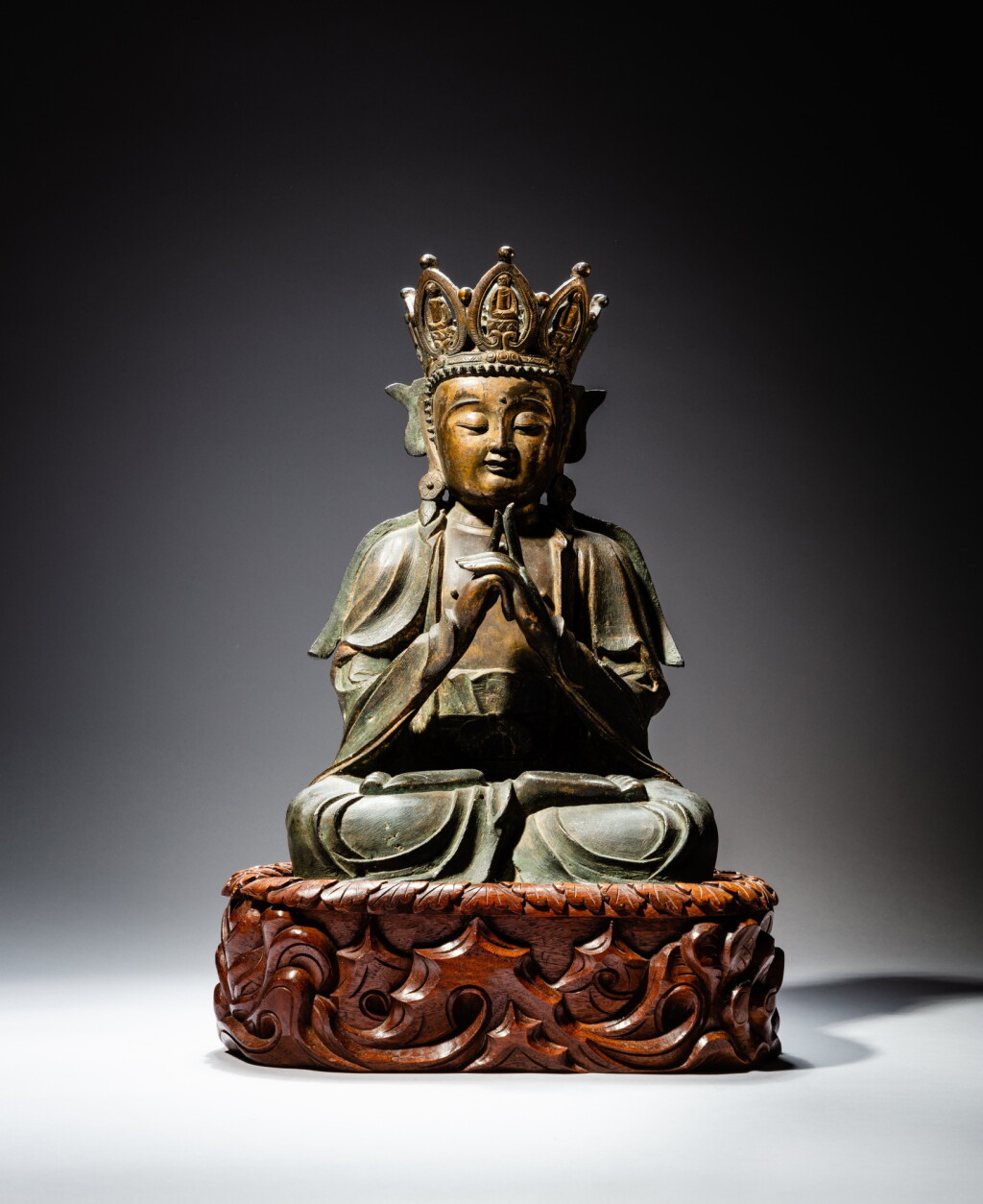 View full screen - View 1 of Lot 228. A bronze figure of Vairochana Buddha Ming dynasty, 17th century | 明十七世紀 普明大日如來佛坐像.