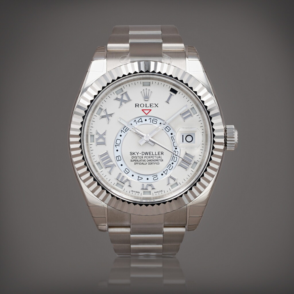 View full screen - View 1 of Lot 396. Sky-Dweller 'stickered', reference 326939 Montre bracelet en or blanc à quantième annuel, double fuseau horaire et date | White gold annual calendar and dual time zone wristwatch with date and bracelet Vers 2015 | Circa 2015.