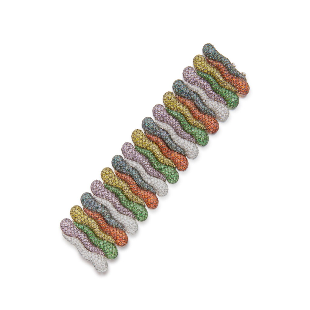 View full screen - View 1 of Lot 169. Fancy Colored Sapphire, Garnet and Diamond Bracelet.