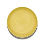A yellow-glazed 'bajixiang' dish, Mark and period of Yongzheng | 清雍正 黃釉刻八吉祥紋盤 《大清雍正年製》款