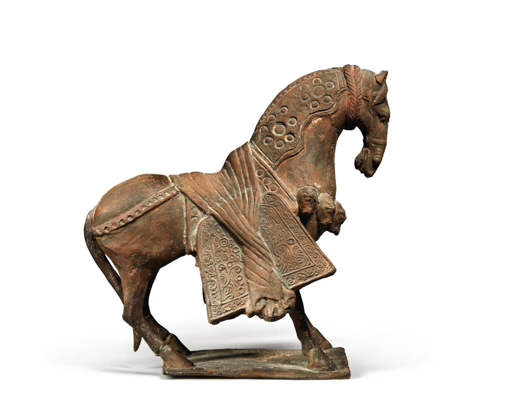 View full screen - View 1 of Lot 1104. A PAINTED POTTERY FIGURE OF A HORSE.