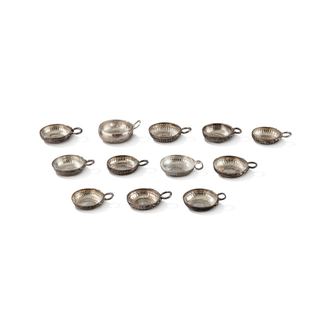 View full screen - View 1 of Lot 1122. A set of twelve French silver wine tasters, 18th and 19th centuries.