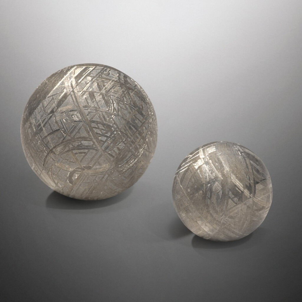 View full screen - View 1 of Lot 114. A Pair of Meteorite Spheres | Gibeon and Muonionalusta.