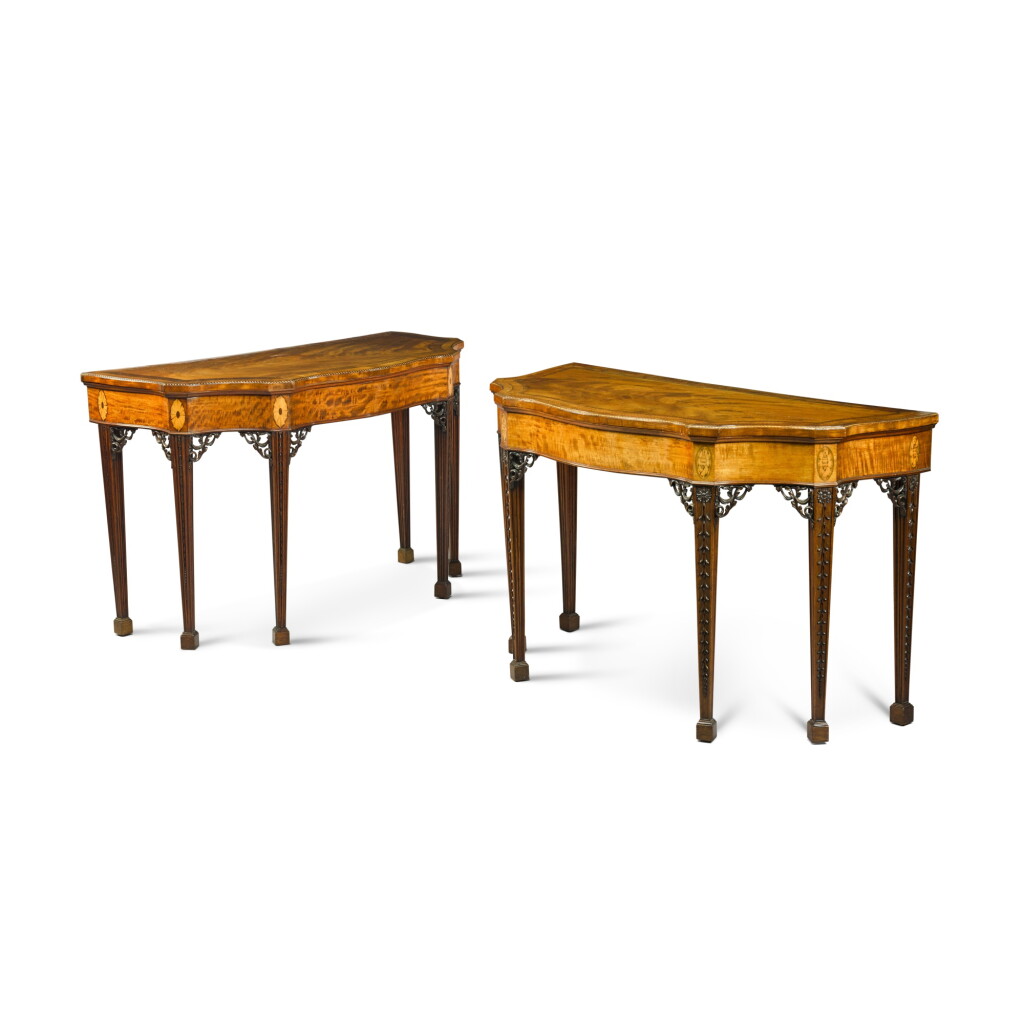 View full screen - View 1 of Lot 60. A near pair of George III mahogany, satinwood, rosewood and chequer-strung and inlaid pier tables, circa 1770.