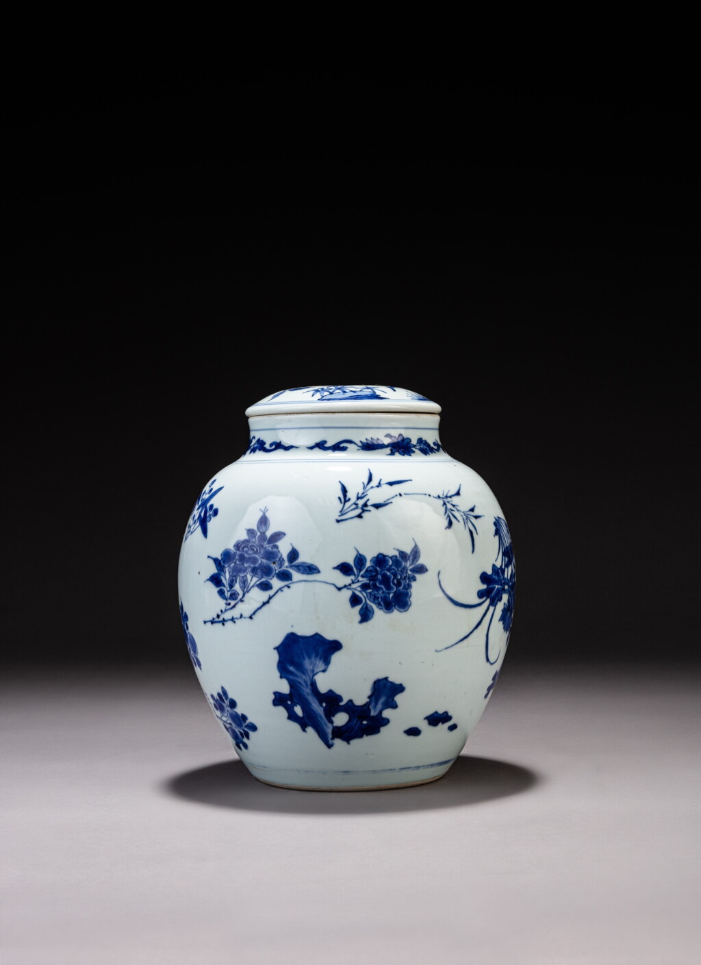 View full screen - View 1 of Lot 394. A blue and white 'floral' jar and cover, Qing dynasty, Kangxi period.