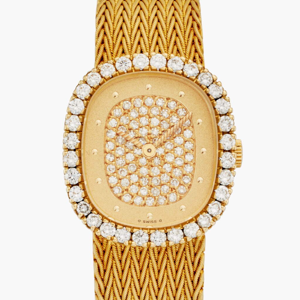 View full screen - View 1 of Lot 383. Reference 4134/910 Ellipse | A yellow gold and diamond-set bracelet watch, Circa 1980.