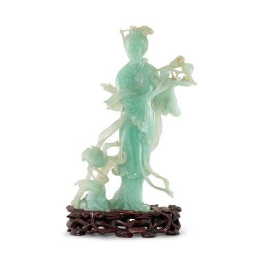 View full screen - View 1 of Lot 312. A jadeite figure of a female immortal, 20th century 二十世紀 翠玉仙女獻壽立像.