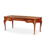 A Louis XV style gilt-bronze mounted kingwood and tulipwood veneered bureau plat, late 19th century | Bureau plat en placage de bois de violette, bois de rose et monture de bronze doré de style Louis XV, fin du XIXe siècle