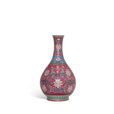View full screen - View 1 of Lot 61. A rare large ruby-ground sgraffiato yangcai 'lotus' bottle vase, Seal mark and period of Qianlong.