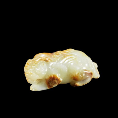 View full screen - View 1 of Lot 3683. A white and russet jade figure of a bixie Song dynasty | 宋 白玉辟邪.