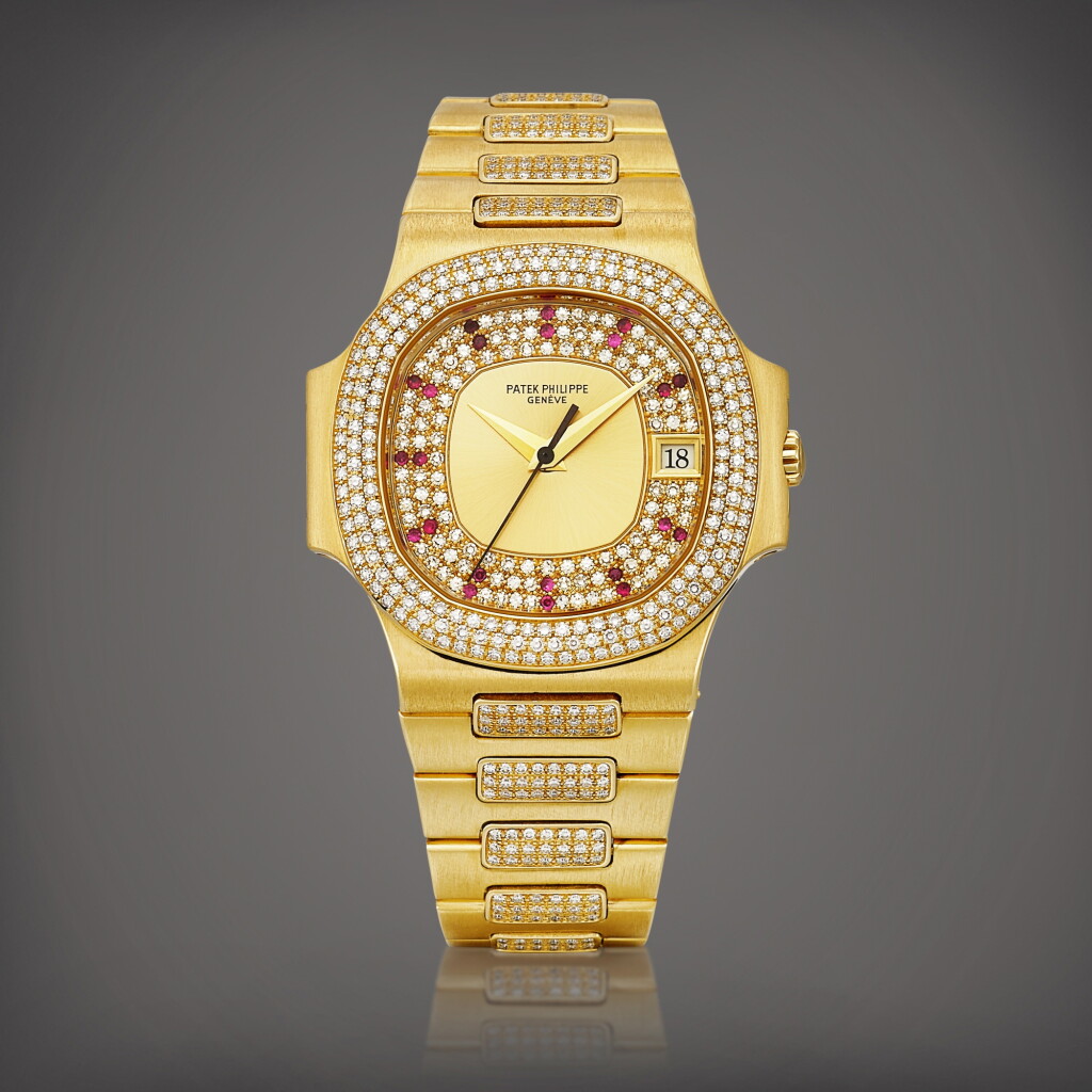 全螢幕檢視 - 查看2138Nautilus, Reference 3800 | A yellow gold, diamond and ruby-set bracelet watch with date, Made in 1994 | 百達翡麗 | NAUTILUS 型號3800 | 黃金鑲鑽石及紅寶石鏈帶腕錶,備日期顯示,1994年製的1