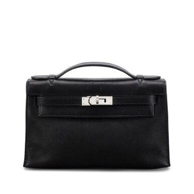 View full screen - View 1 of Lot 627. Black Evergrain Kelly Pochette Palladium Hardware, 2004.