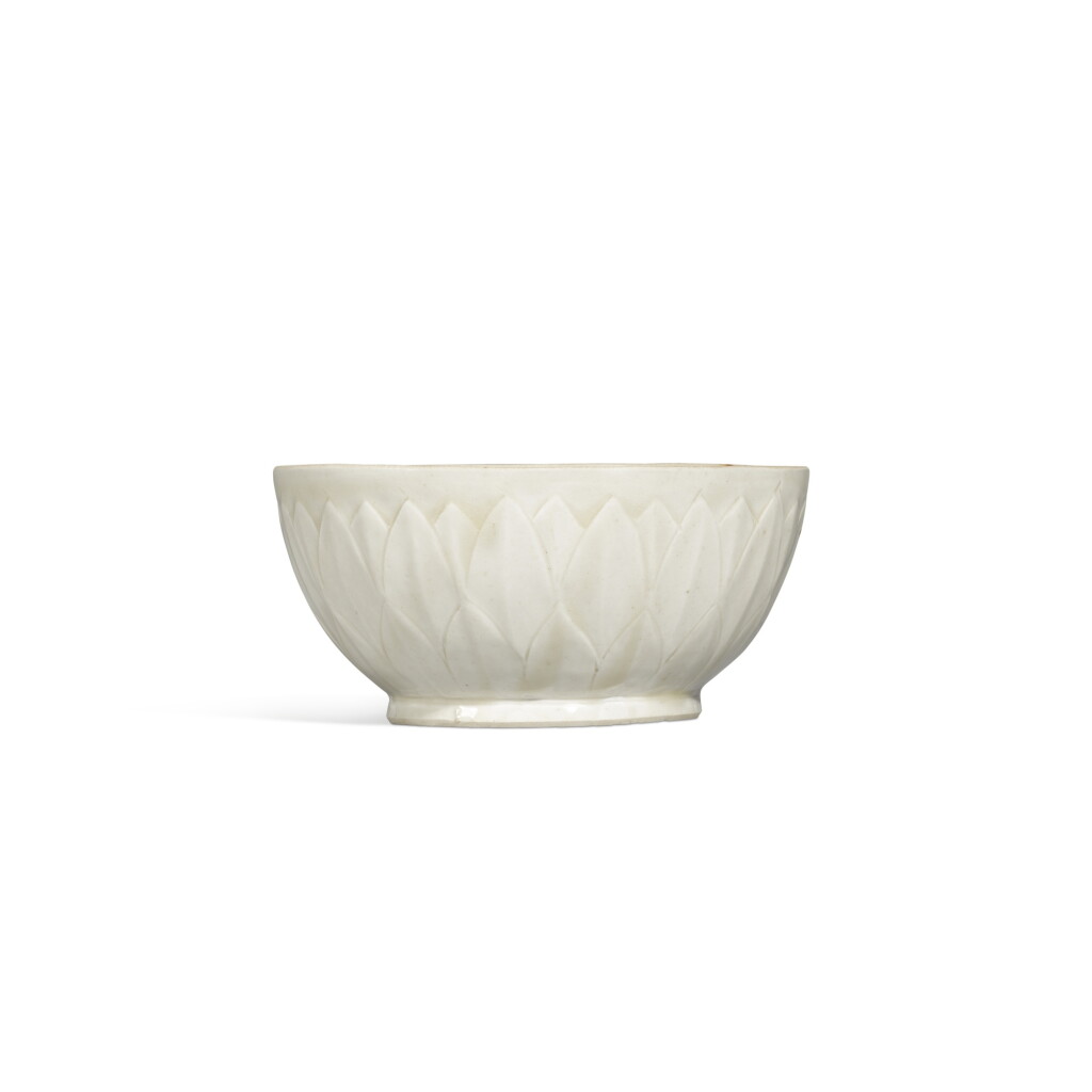 View full screen - View 1 of Lot 129. A rare carved 'Ding' 'lotus' bowl, Northern Song dynasty.