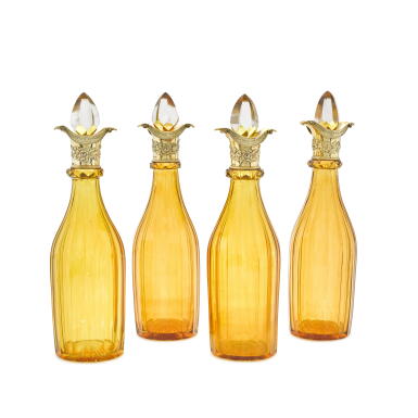 View full screen - View 1 of Lot 110. Royal: a cased set of four William IV silver-gilt-mounted liqueur decanters, John Eldershaw Brunt, London, 1836.