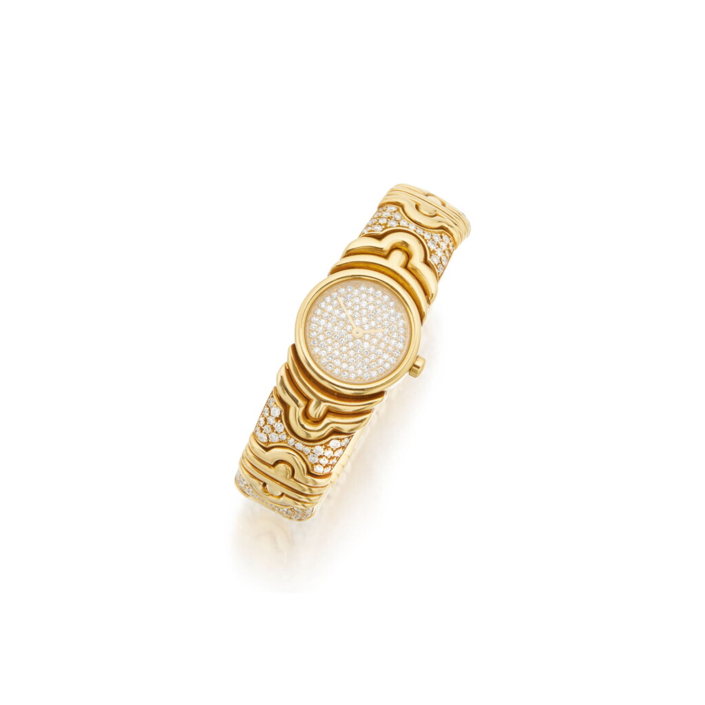 View full screen - View 1 of Lot 51. GOLD AND DIAMOND 'PARENTESI' BRACELET-WATCH, BULGARI.