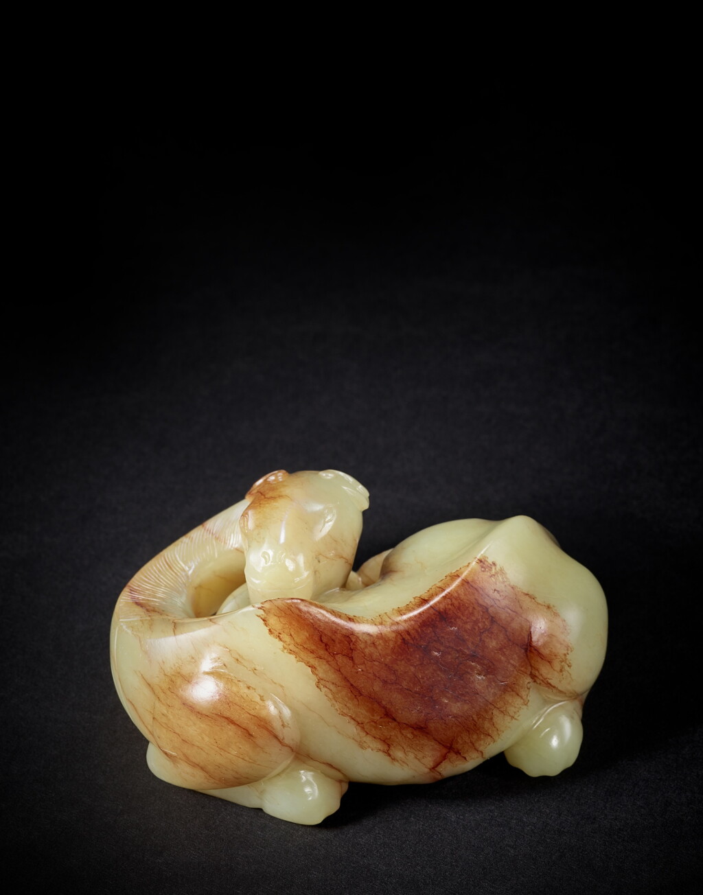 View full screen - View 1 of Lot 9810. A superb and large yellow jade figure of a camel, Tang – Song dynasty | 唐至宋 黃玉駱駝.