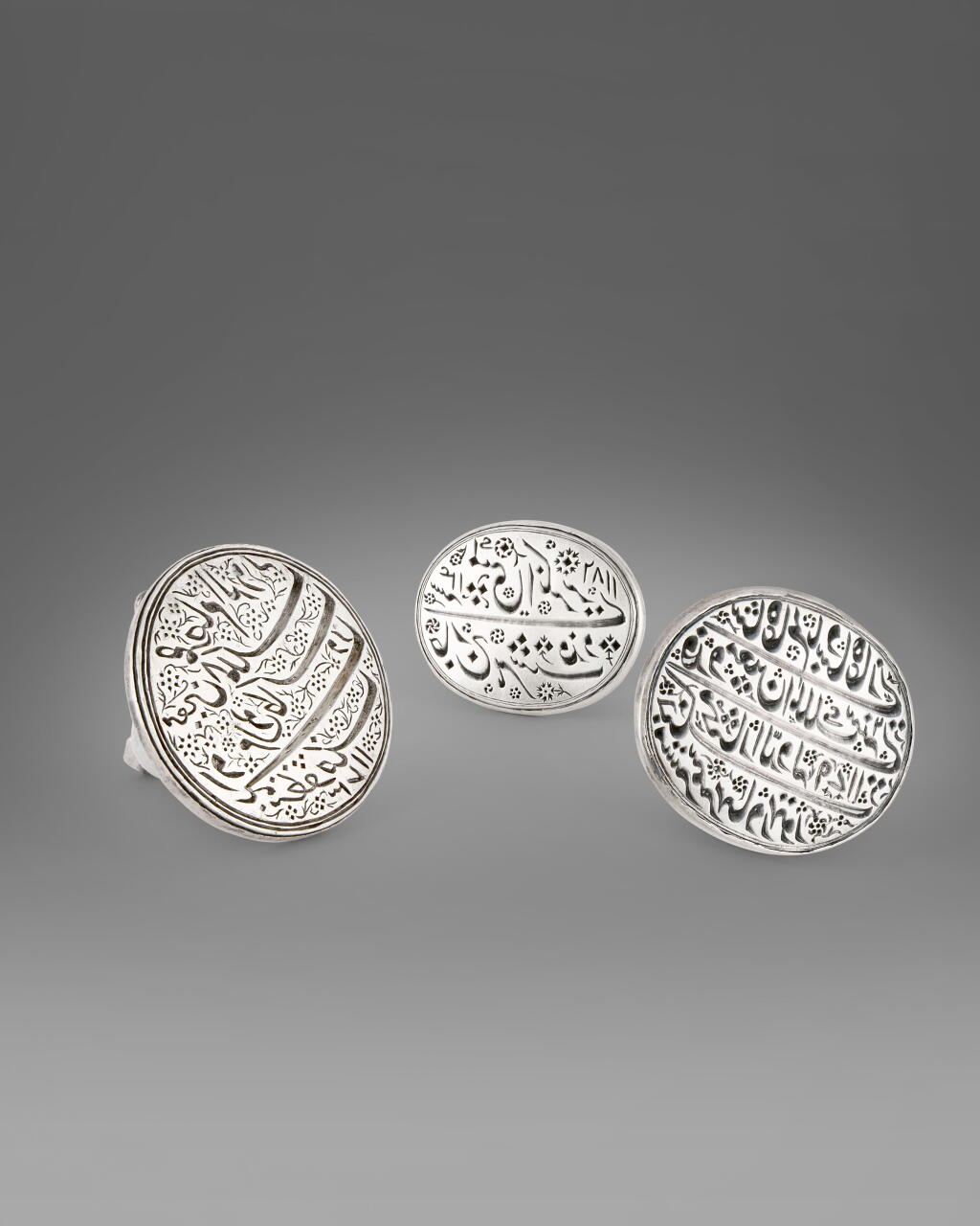 View full screen - View 1 of Lot 653. Three Mughal Silver Seals, India, 18th Century.