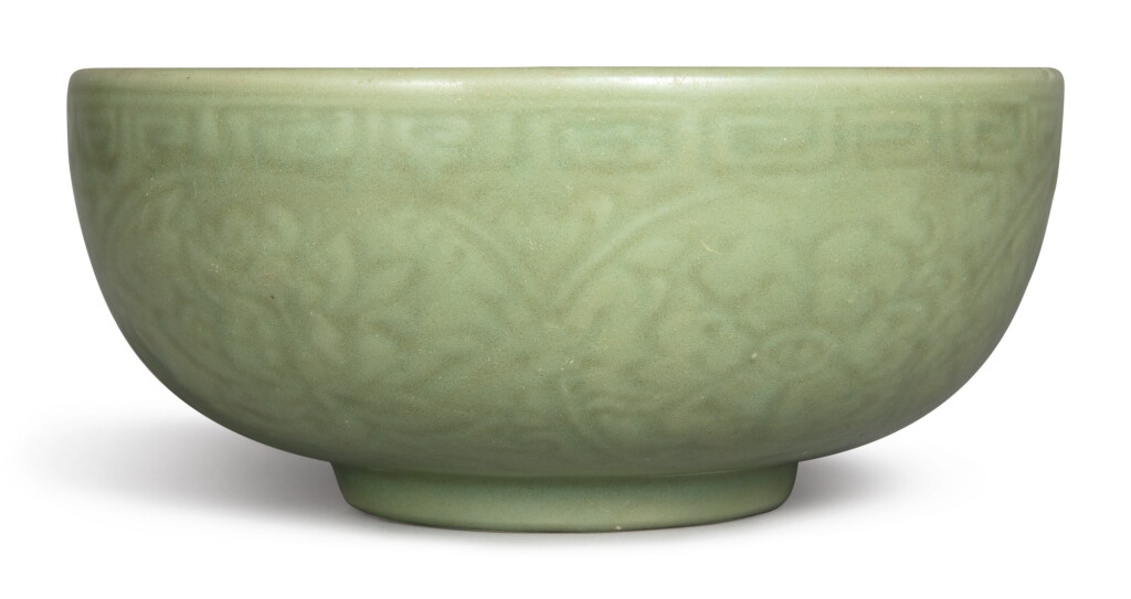 View full screen - View 1 of Lot 1132. A CARVED 'LONGQUAN' CELADON-GLAZED 'LOTUS' BOWL, MING DYNASTY, 15TH CENTURY.