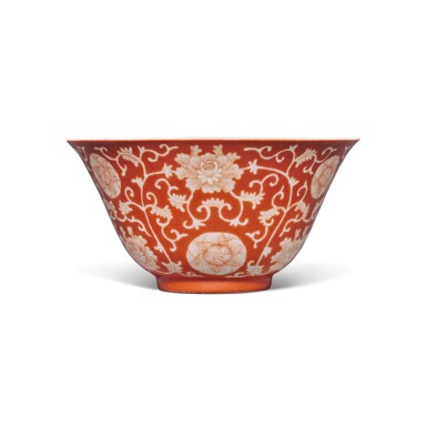 View full screen - View 1 of Lot 108. A coral-ground reverse-decorated 'lotus' bowl, Seal mark and period of Qianlong.