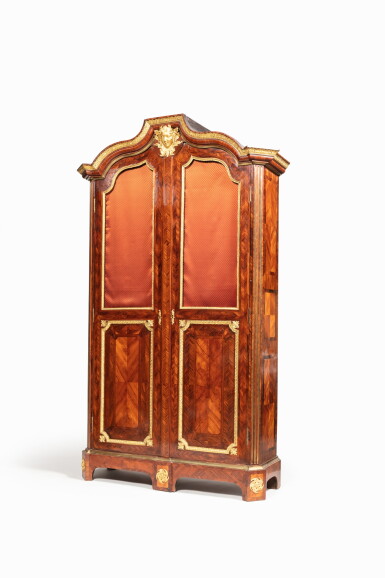 View full screen - View 1 of Lot 341. A late Louis XIV kingwood and tulipwood veneered armoire, circa 1710, attributed to Joseph Poitou | Armoire à portes en placage de bois de violette et bois de rose de la fin de l’époque Louis XIV, vers 1710, attribuée à Joseph Poitou.