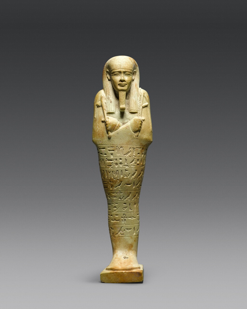 View full screen - View 1 of Lot 9. An Egyptian Pale Blue-green Ushabti of Neferibresaneith, 26th Dynasty, period of Amasis, 570-526 B.C..