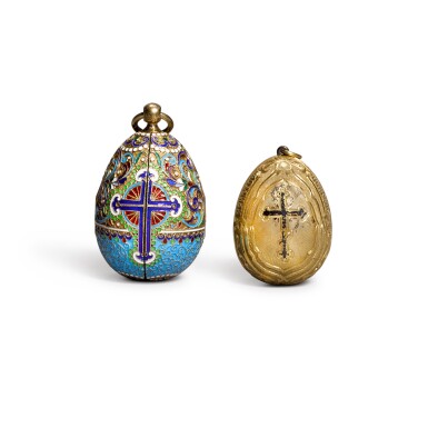 View full screen - View 1 of Lot 91. A silver-gilt locket egg icon, Rückert, Moscow, circa 1900, and cloisonné enamel locket egg icon, St Petersburg, 1908-1917.