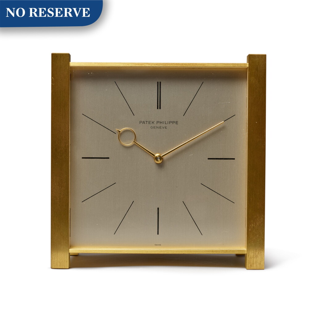 View full screen - View 1 of Lot 21. PENDULE CARRÉE A GILT BRASS SOLAR DESK CLOCK, CIRCA 1968.
