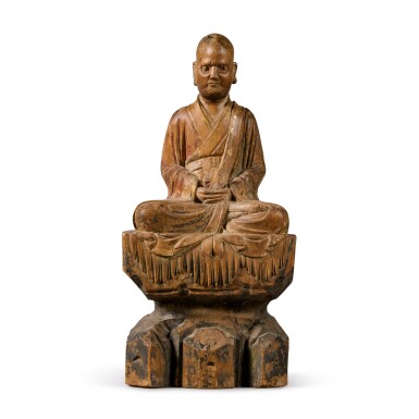 View full screen - View 1 of Lot 108. A polychrome-painted wood figure of a luohan, Ming dynasty | 明 木雕加彩羅漢坐像.