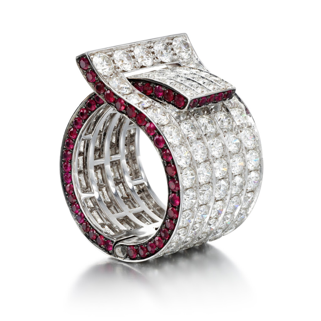 View full screen - View 1 of Lot 1004. White gold, diamond and ruby adjustable ring, 'Buckle' .