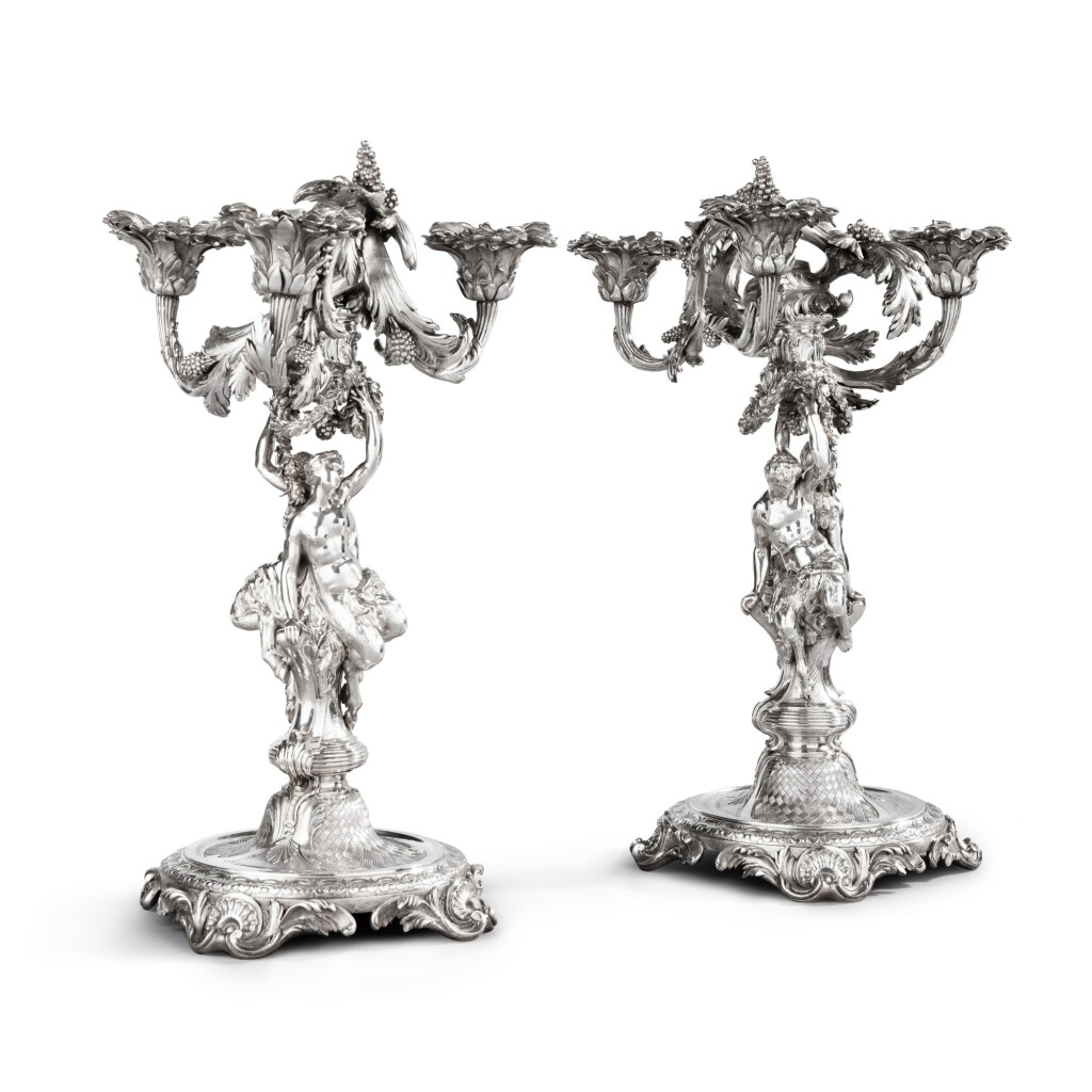 View full screen - View 1 of Lot 826. A pair of George II silver figural three-light candelabra, George Wickes, London, 1744.