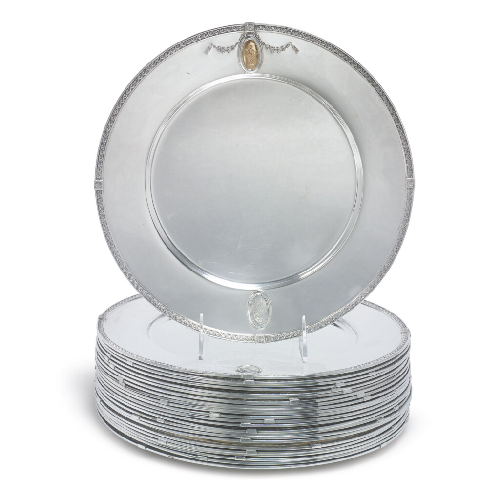 View full screen - View 1 of Lot 892. A SET OF TWENTY-FOUR AMERICAN SILVER AND GOLD POMPEIAN PATTERN PLATES, SOME BY DOMINICK & HAFF, NEW YORK, EARLY 20TH CENTURY.