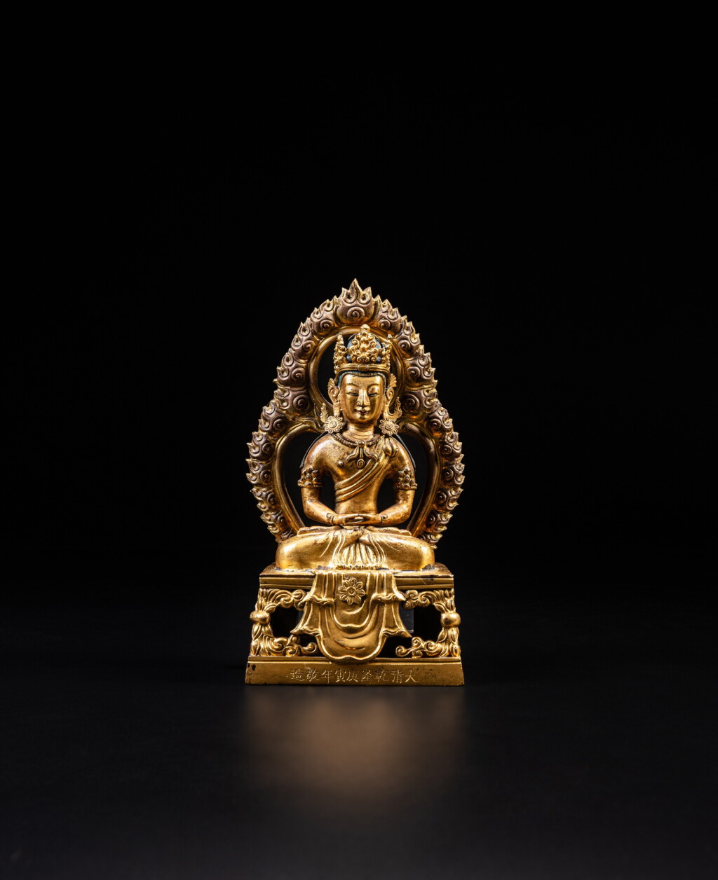 View full screen - View 1 of Lot 22. A gilt-bronze figure of Amitayus, Mark and period of Qianlong, dated gengyin year, corresponding to 1770.