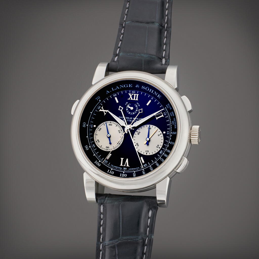 View full screen - View 1 of Lot 65. Reference 404.035 Saxonia Double Split | A platinum double split flyback chronograph wristwatch with power reserve indication and hacking dead seconds, Circa 2010 .