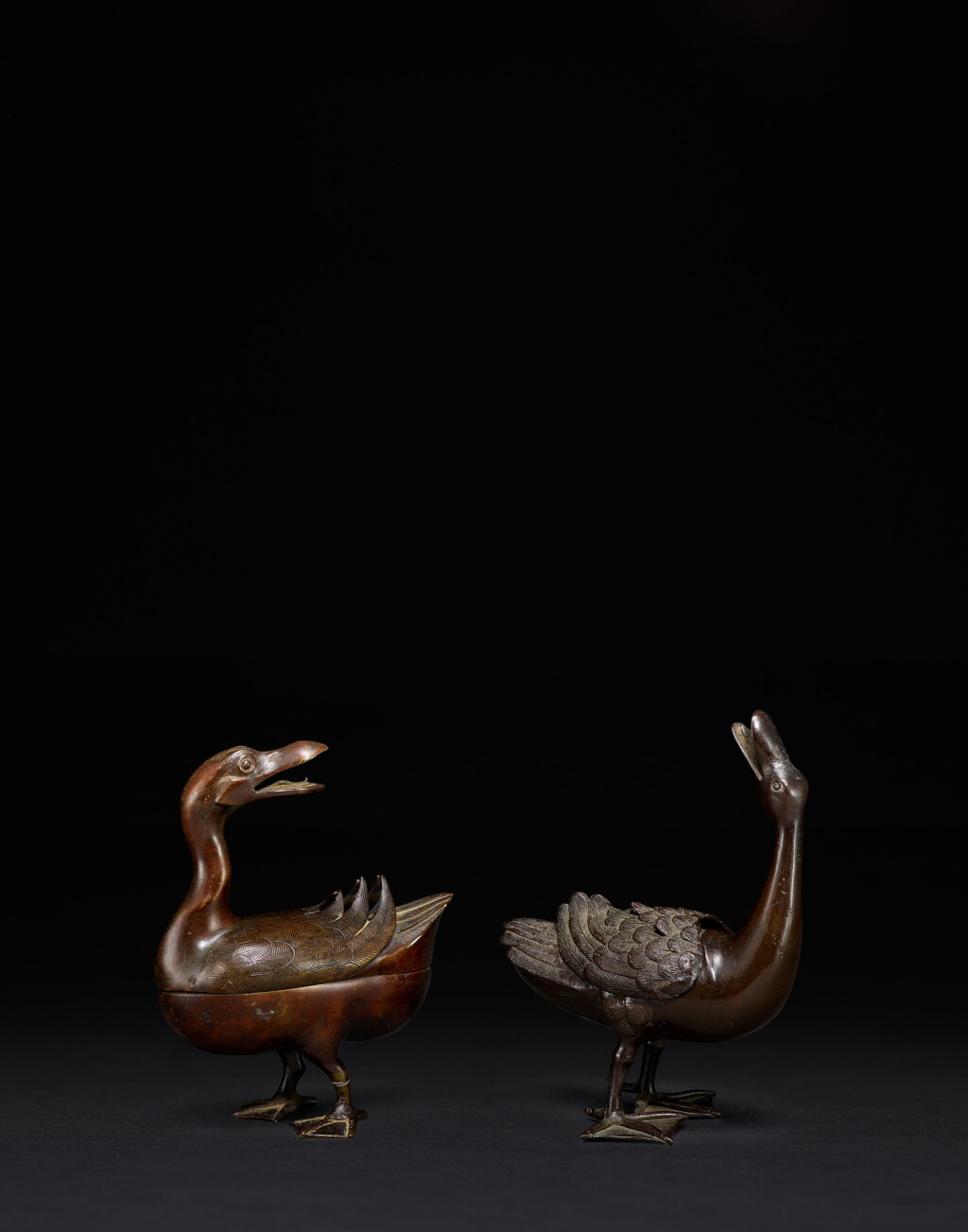 View full screen - View 1 of Lot 57. Two pairs of bronze 'mandarin duck' incense burners and covers, Qing dynasty, 17th / 18th century.