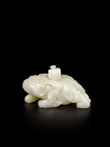 View full screen - View 1 of Lot 92. A celadon jade 'mythical beast' water dropper and a cover, Ming dynasty.