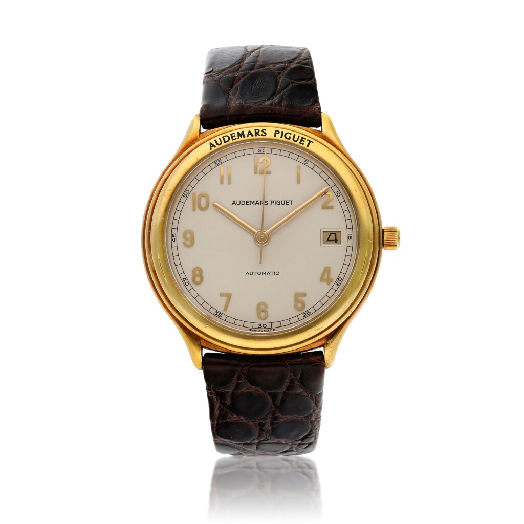 View full screen - View 1 of Lot 160. Jules Audemars, A yellow gold automatic wristwatch with date, Circa 1995.