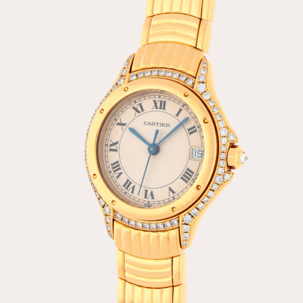 全螢幕檢視 - 查看258Cougar, Reference C887907 | A yellow and diamond-set wristwatch with bracelet | Circa 1995的1