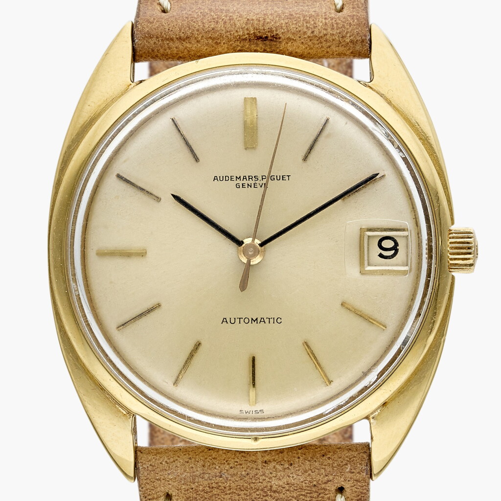 View full screen - View 1 of Lot 682. Reference 5205 | A yellow gold automatic wristwatch, Circa 1960s.