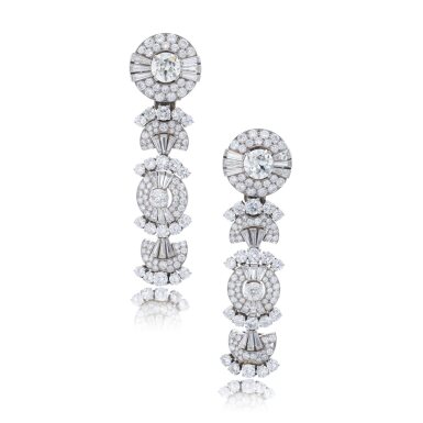 View full screen - View 1 of Lot 761. Pair of diamond pendent ear clips, mid-20th century.