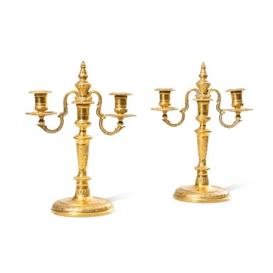 View full screen - View 1 of Lot 210. A pair of Régence style gilt-bronze two-light candelabra, attributed to Alfred Beurdeley, circa 1840 | Paire de candélabres à deux lumières en bronze doré de style Régence, attribuée à Alfred Beurdeley, vers 1840.