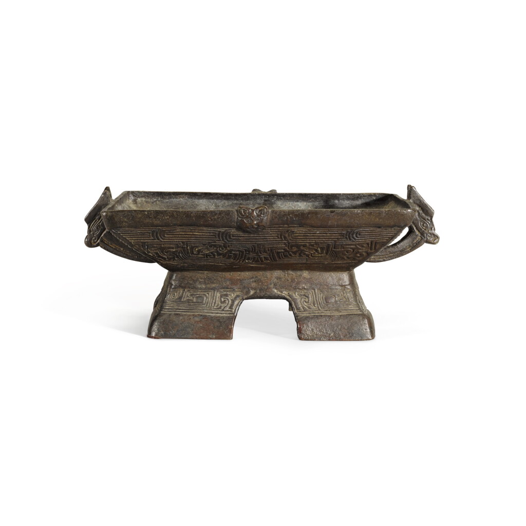 View full screen - View 1 of Lot 121. A rare inscribed and dated archaistic bronze vessel, fu Yuan dynasty, dated to the bingzi year of the Zhiyuan reign (1276 or 1336) | 元 1276或1336年 銅簠.