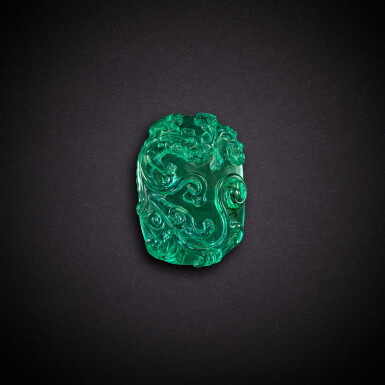 View full screen - View 1 of Lot 5847. A green glass 'chilong' belt buckle, Qing dynasty, 18th - 19th century | 清十八至十九世紀 綠料螭龍紋帶扣.